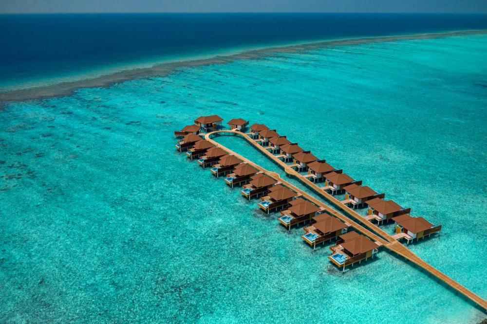 Luxury beachfront hotel with private pool in Maldives or Caribbean